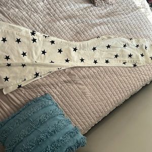 Buckle, white and black star bell bottoms. Brand new with tag